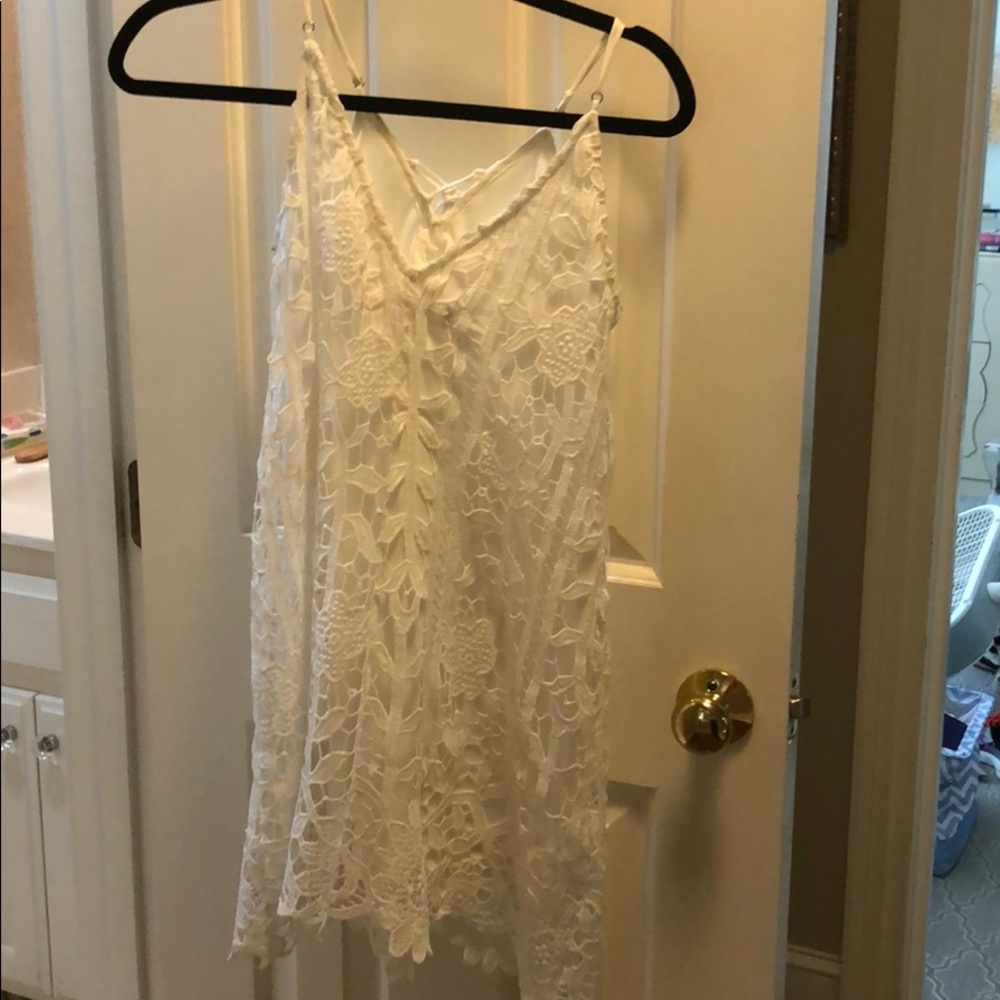 White flowered shirt dress from the impeccable pig